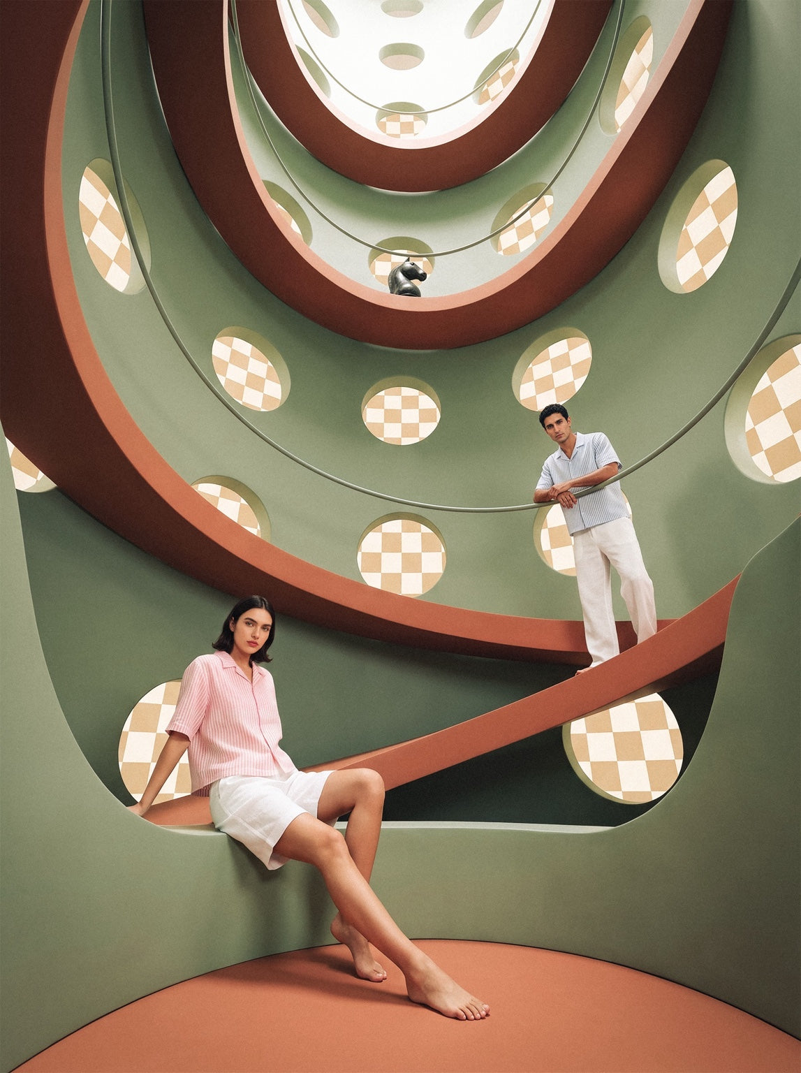 Pawn Up models inside a circular chess interior